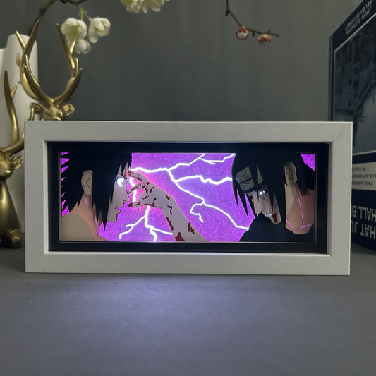 Lampa de birou inspirata din anime-ul Naruto Shippuden cu batalia dintre personajele Itachi si Sasuke Uchiha